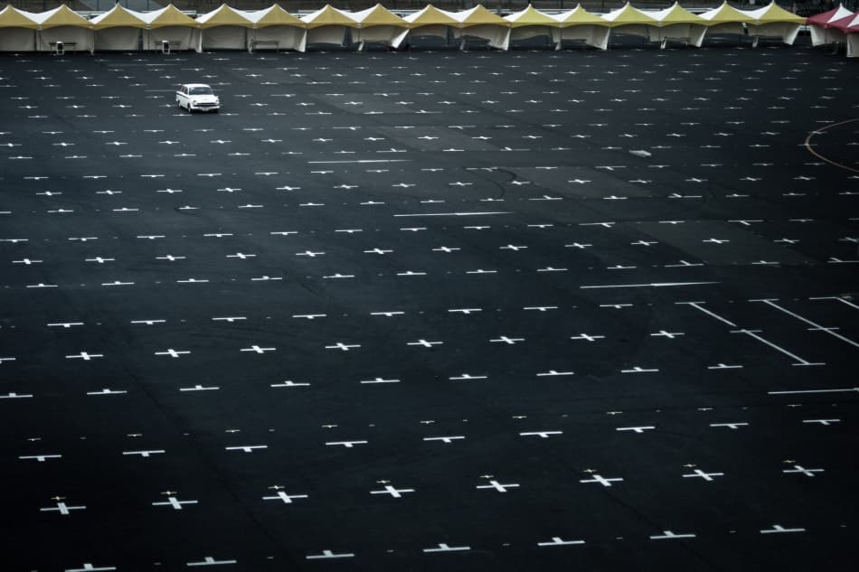 Solitary Car Empty Lot by Kouji Tomihisa — canvas wall art