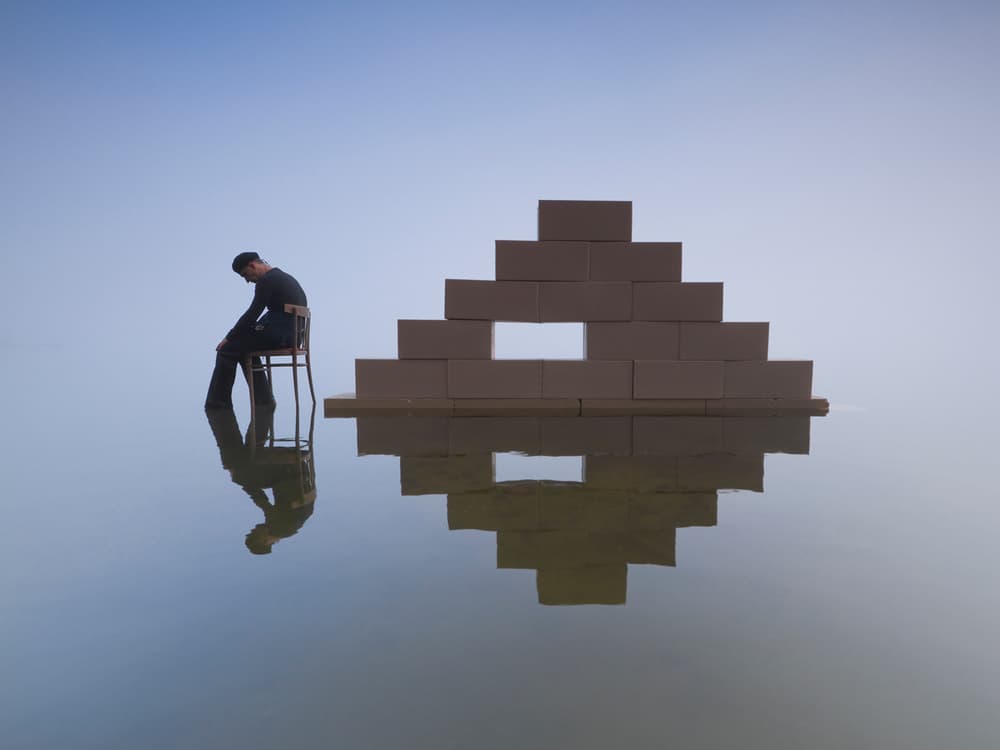 Man And Reflective Boxes by Leszek Paradowski — canvas wall art