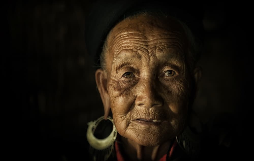 Wise Old Face by Sarawut Intarob — canvas wall art