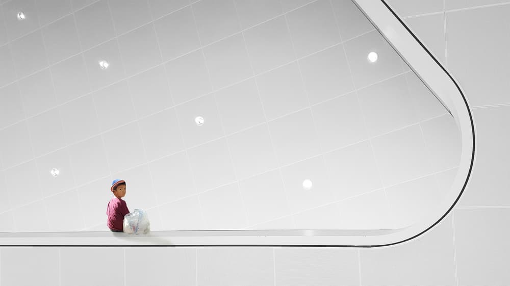 Boy In White Space by Huib Limberg — canvas wall art