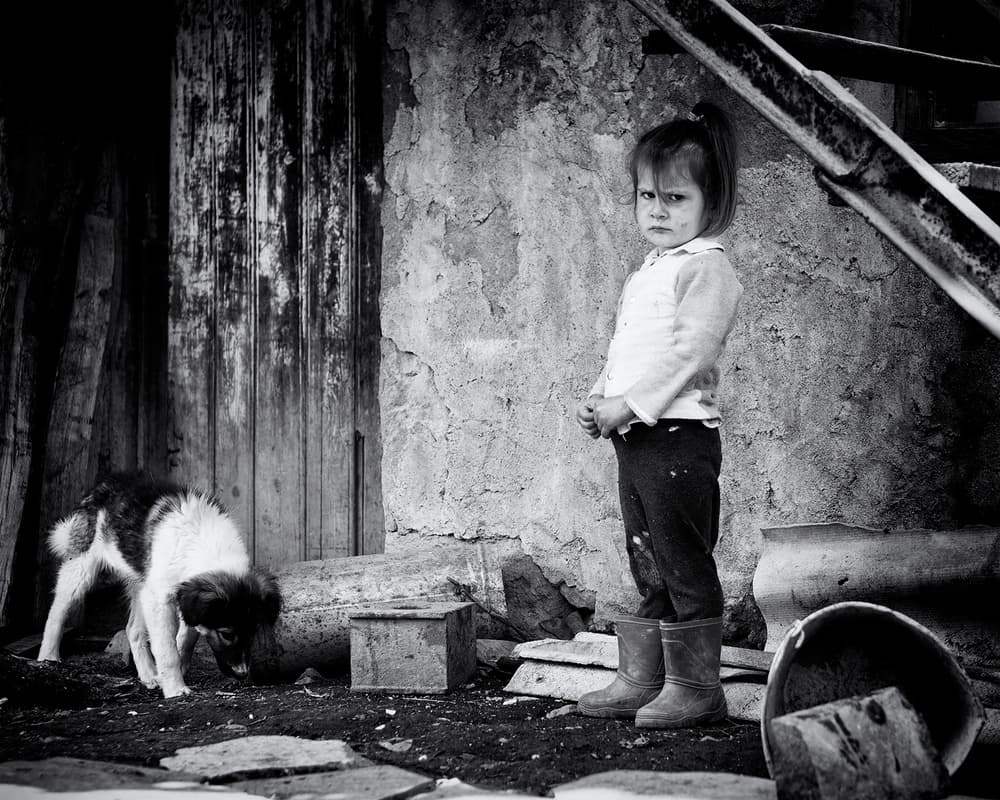 Serious Child with Dog by Marcel Rebro — canvas wall art