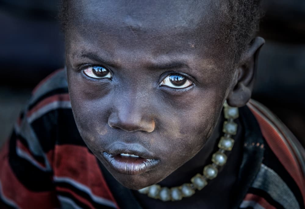 Soulful Child's Gaze by Joxe Inazio Kuesta Garmendia — canvas wall art