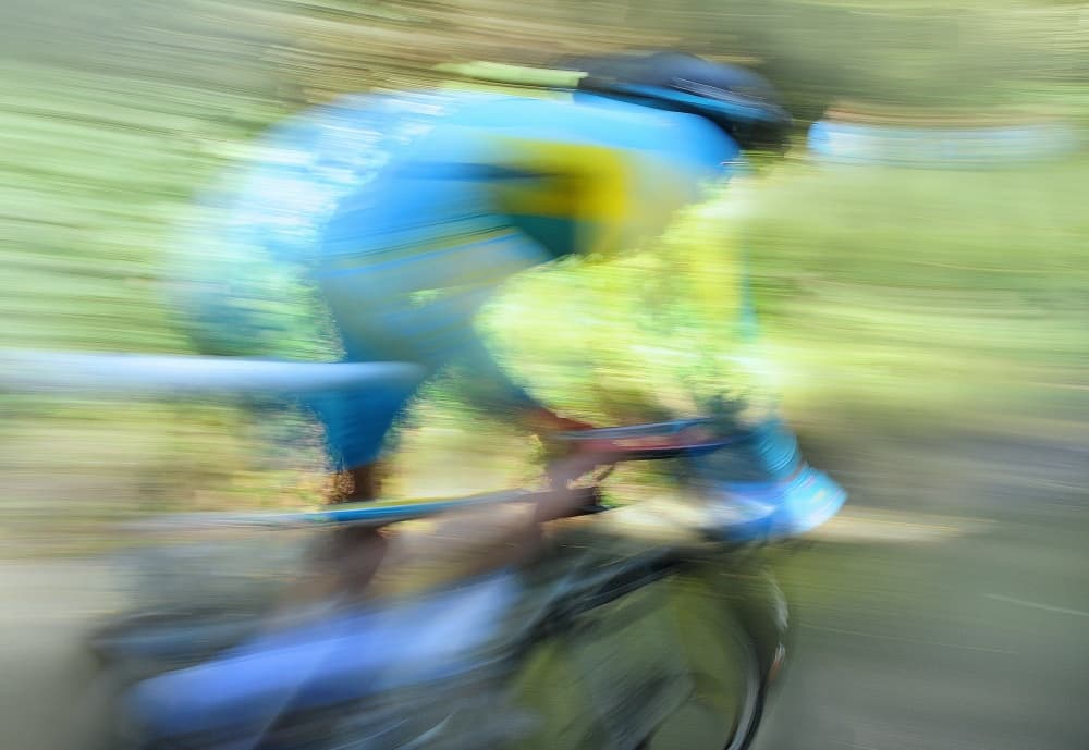 Cyclist Speed Blur by Lou Urlings — canvas wall art