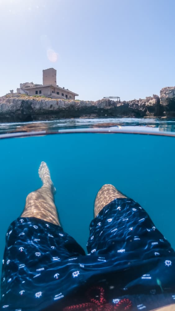 Split View Island Swim by Hilal safarjalani — canvas wall art
