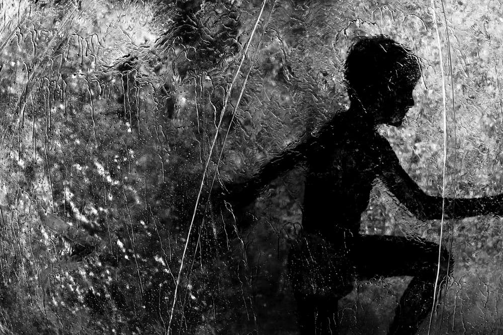 Child Through Textured Glass by Bogdan Bouşcă — canvas wall art