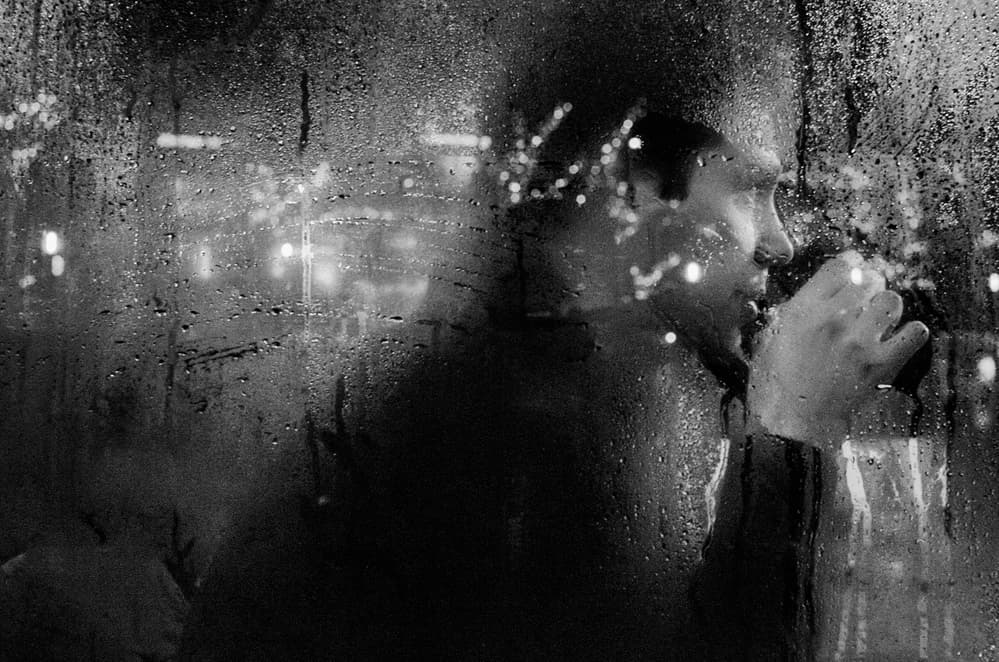 Man at Rainy Window by Carlo Tonti — canvas wall art