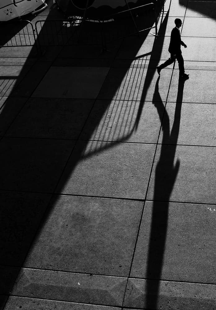 Man With Long Shadow by Jian Wang — canvas wall art