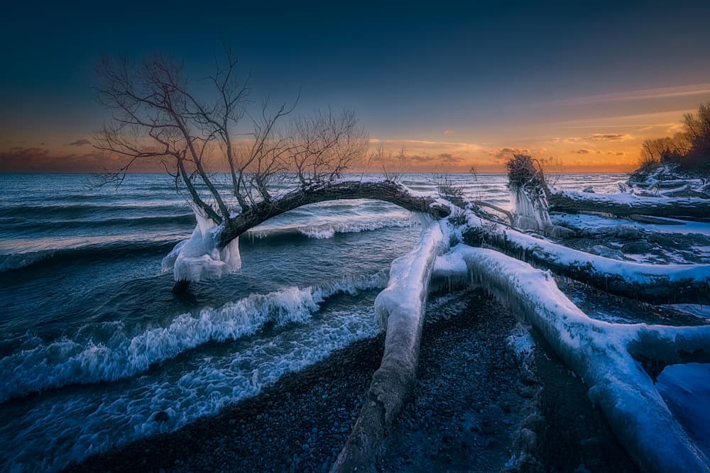 Frozen Beach Sunset by Ben.C.L — canvas wall art