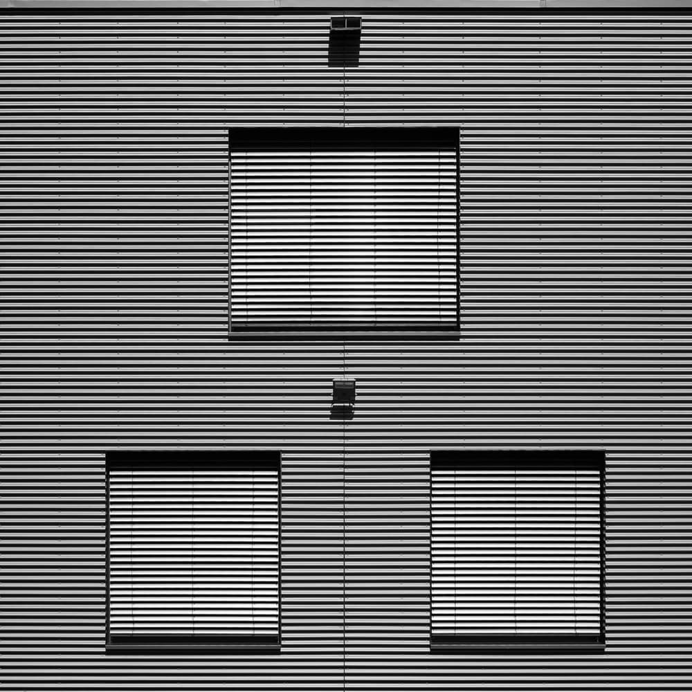 Striped Building Facade by Markus Auerbach — canvas wall art