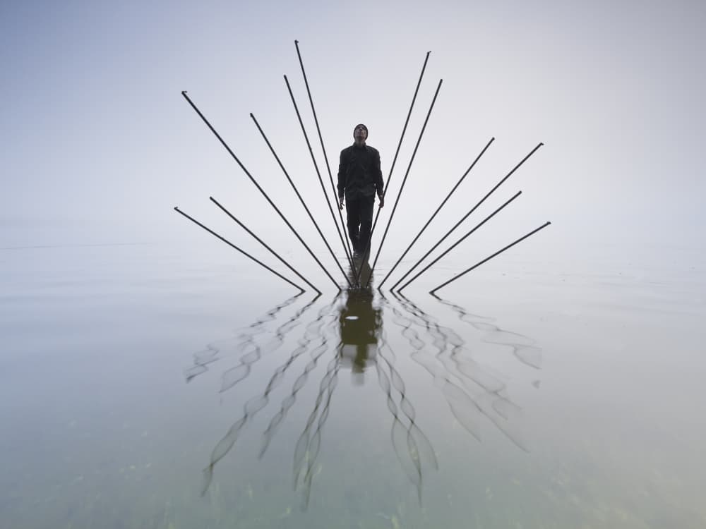 Man In Serene Reflection by Leszek Paradowski — canvas wall art
