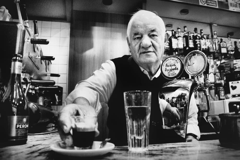 Bartender Serving Espresso by Antonio Grambone — canvas wall art