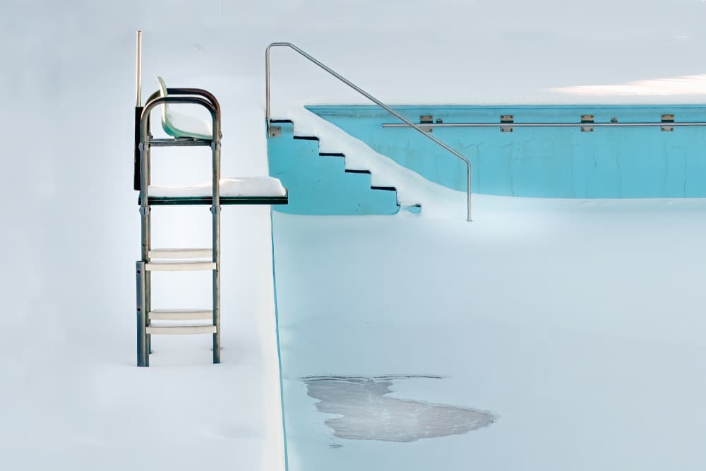 Snowy Pool and Chair by Michel Groleau — canvas wall art