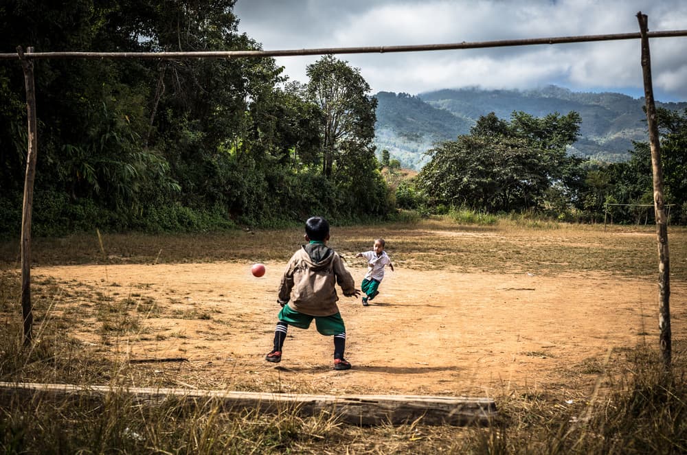 Rural Soccer Game by Marco Tagliarino — canvas wall art