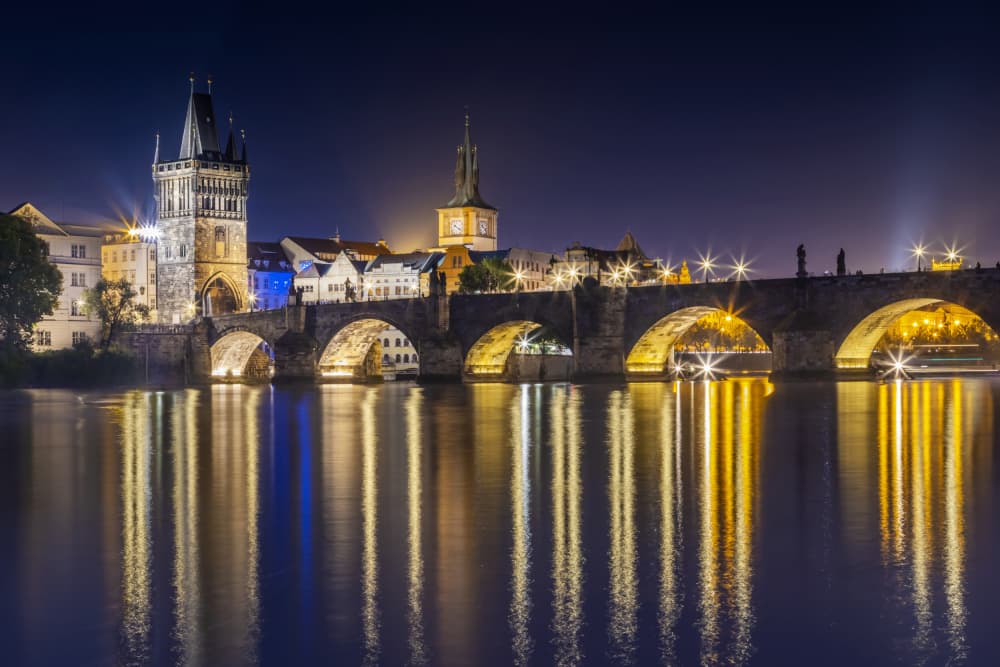Charles Bridge Night Reflections by Melanie Viola — canvas wall art