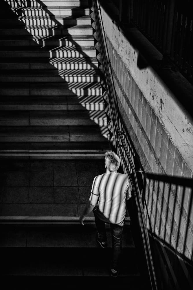 Shadow Play on City Stairs by Eiji Yamamoto — canvas wall art