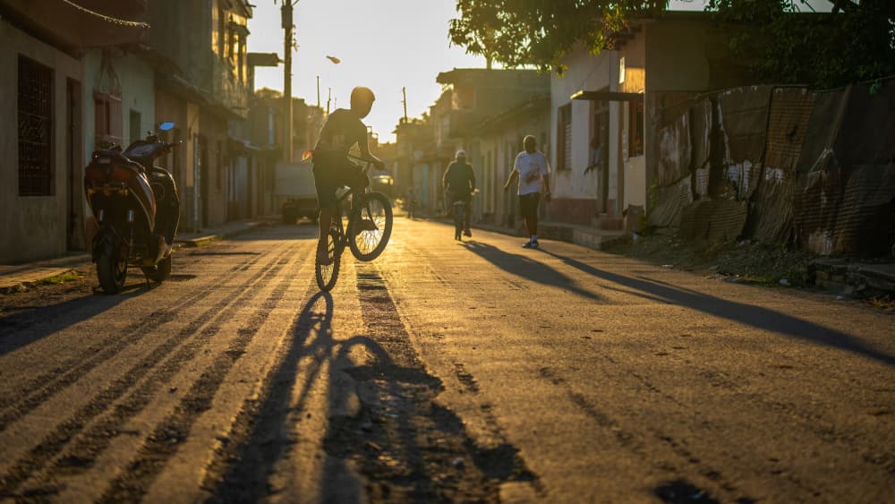 Golden Hour Wheelie by John J. Chen — canvas wall art