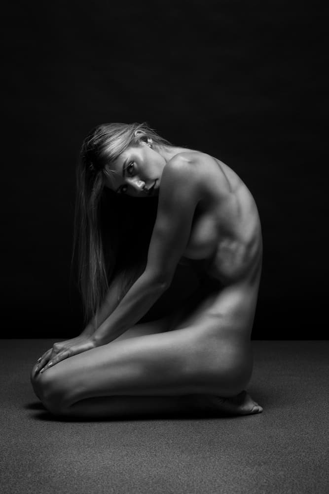 Graceful Kneeling Nude by Anton Belovodchenko — canvas wall art