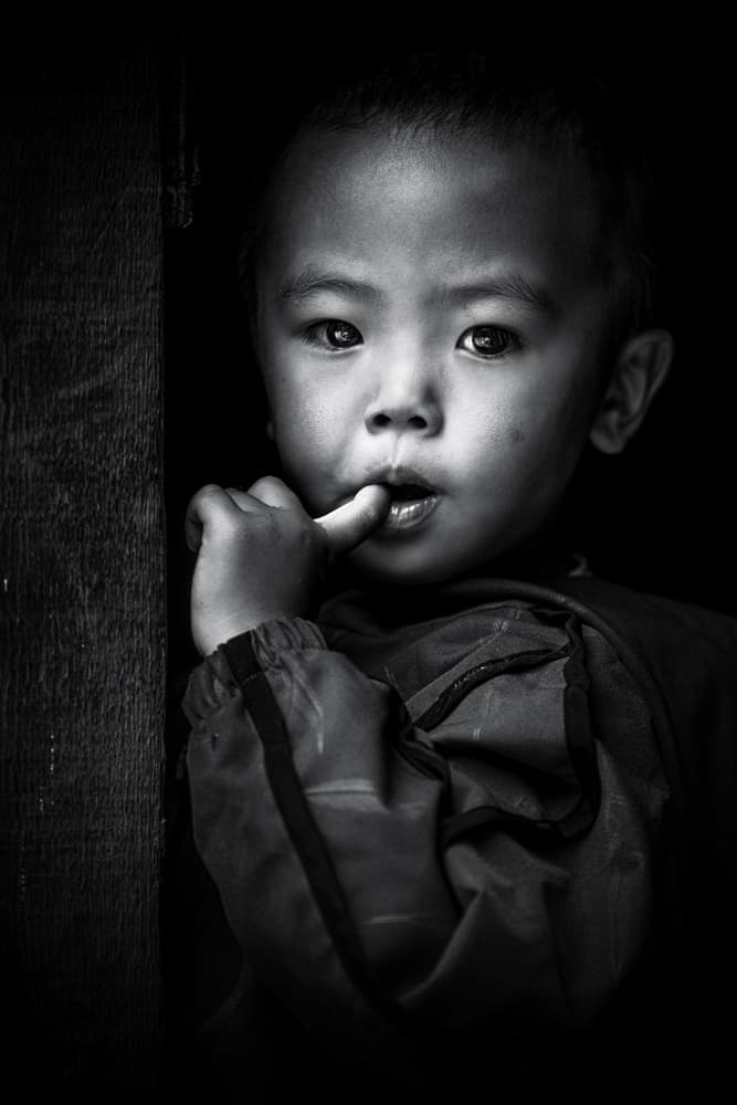 Curious Boy Portrait by Marco Tagliarino — canvas wall art
