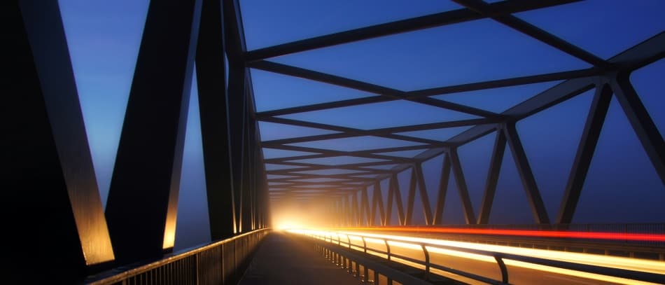 Night Bridge Light Trails by Norbert Maier — canvas wall art