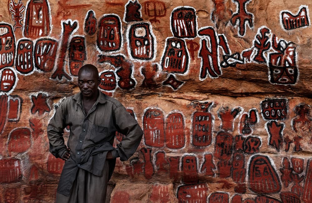 African Man Ancient Symbols by Joxe Inazio Kuesta Garmendia — canvas wall art