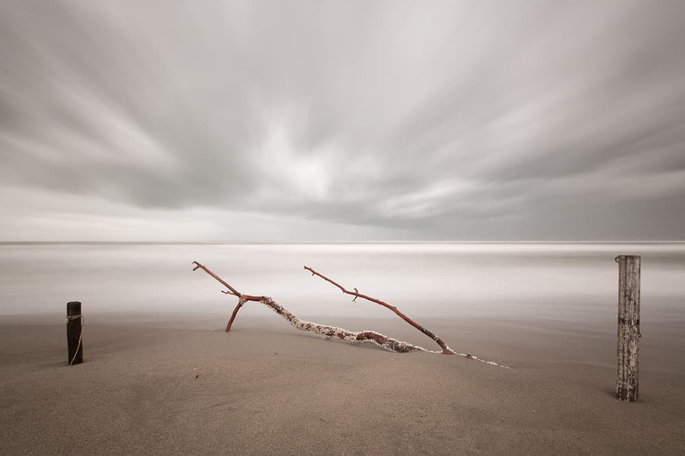 Tranquil Beach Long Exposure by Massimo Della Latta — canvas wall art