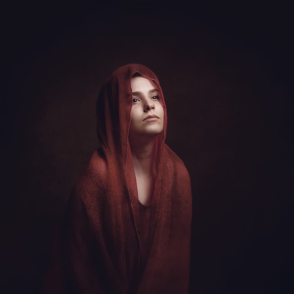 Contemplative Red Hood by Moein Hasheminasab — canvas wall art