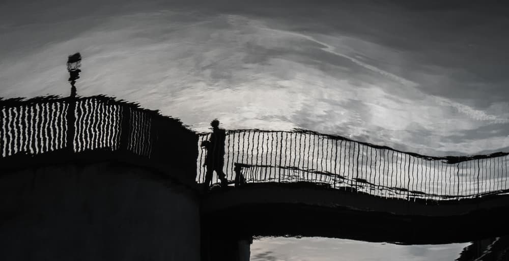Walking Silhouette on Bridge by Gilbert Claes — canvas wall art
