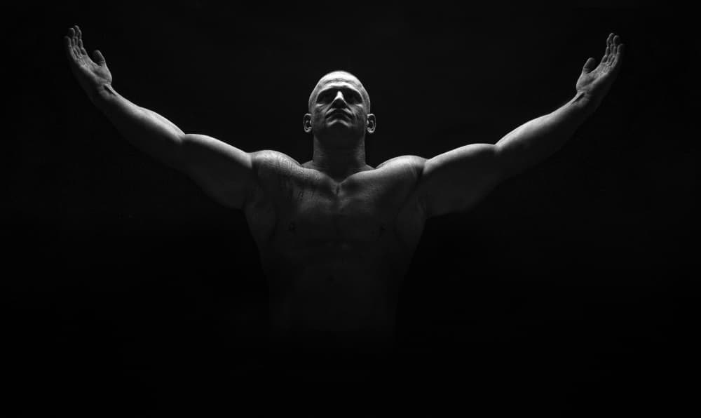 Powerful Man Arms Up by Krisztina Lacz — canvas wall art