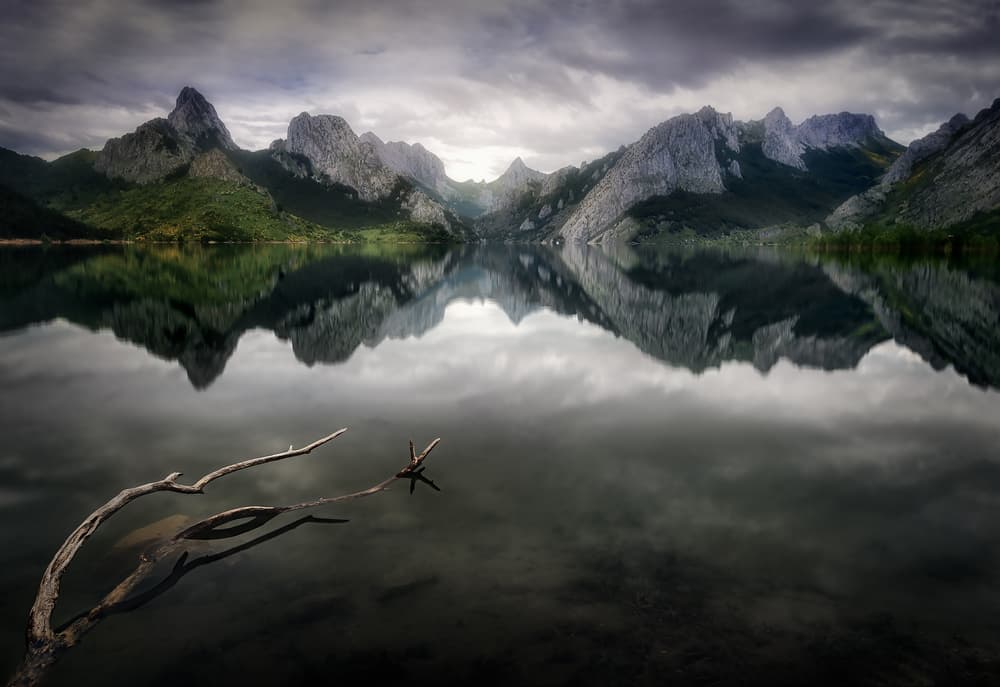 Serene Mountain Lake Reflections by Fran Osuna — canvas wall art