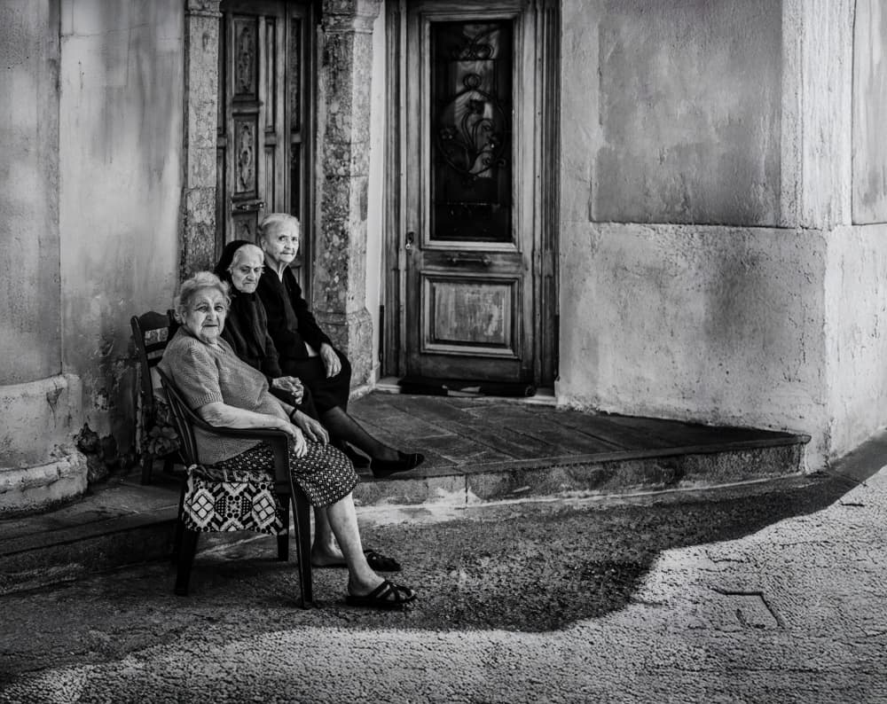 Three Elderly Women Street Scene by Ömer Ates Kızıltug — canvas wall art