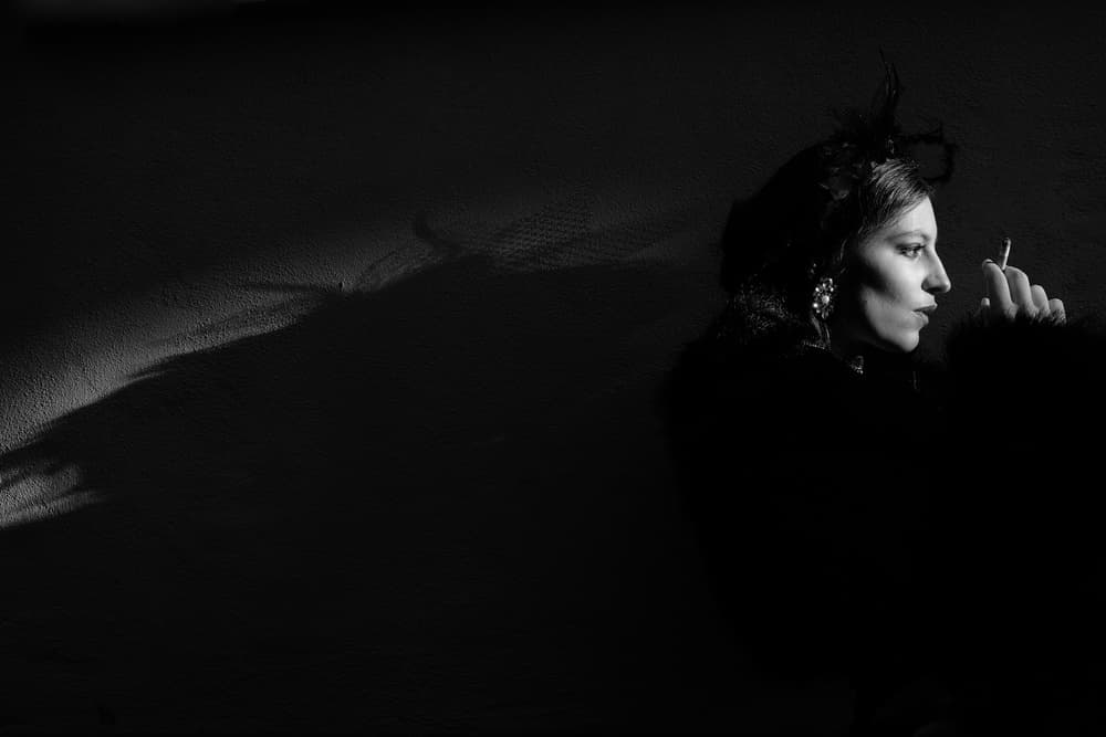 Mysterious Woman Smoking by Josefina Melo — canvas wall art