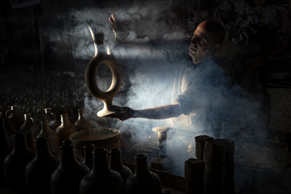 Master Potter At Work by Linda Wride — canvas wall art