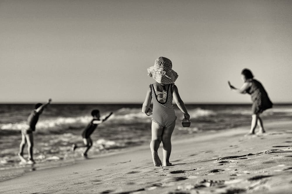 Little Girl On Beach by Despird Zhang — canvas wall art