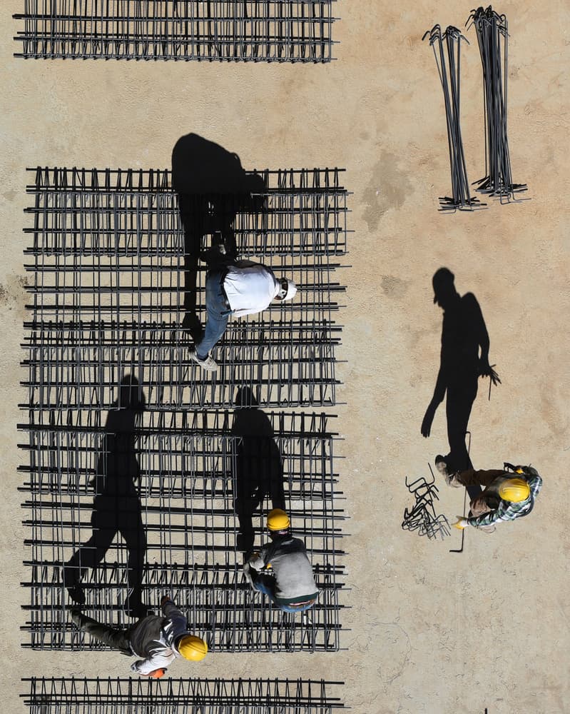 Building Foundation Shadows by Ali Can — canvas wall art