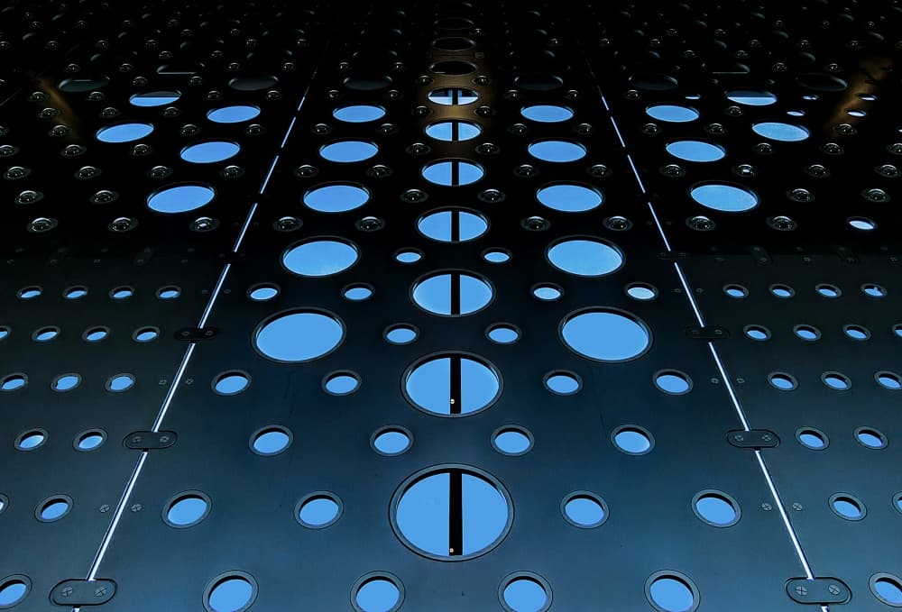Perforated Metal Sky by Tomoshi Hara — canvas wall art