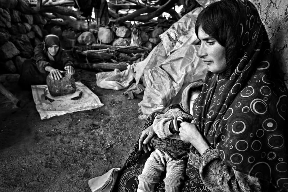 Pensive Mother And Child by Mohammadreza Momeni — canvas wall art