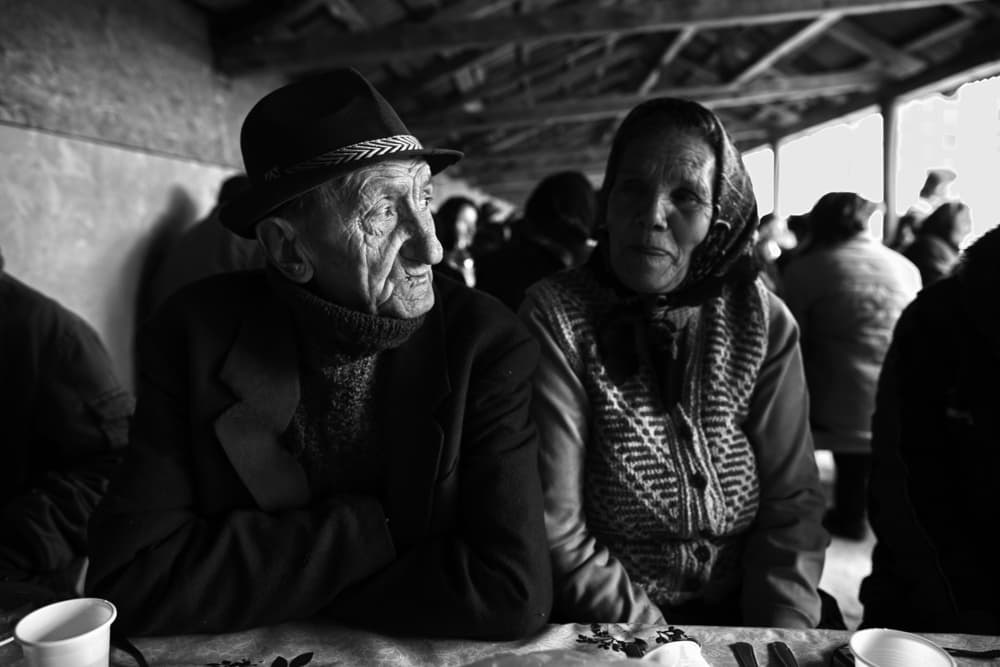 Thoughtful Senior Couple by Julien Oncete — canvas wall art