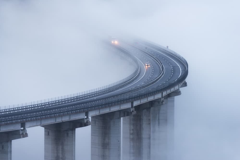 Misty Highway Bridge by Riccardo Lucidi — canvas wall art