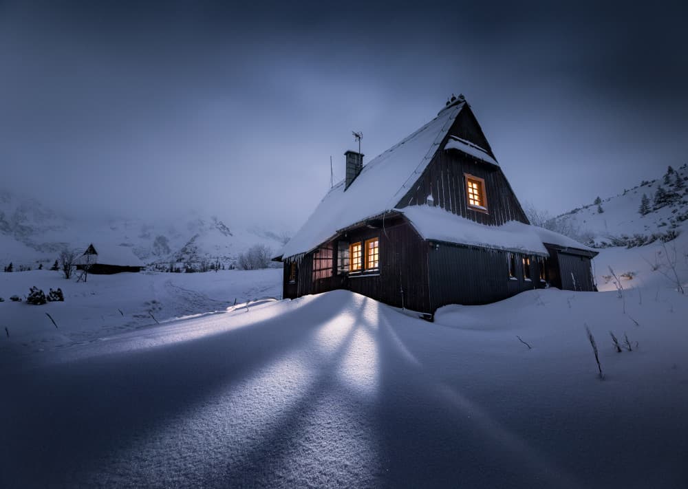 Cozy Winter Cabin by Karol Nienartowicz — canvas wall art