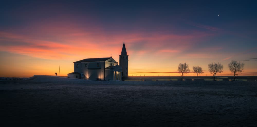 Twilight Winter Church by Tommaso Pessotto — canvas wall art