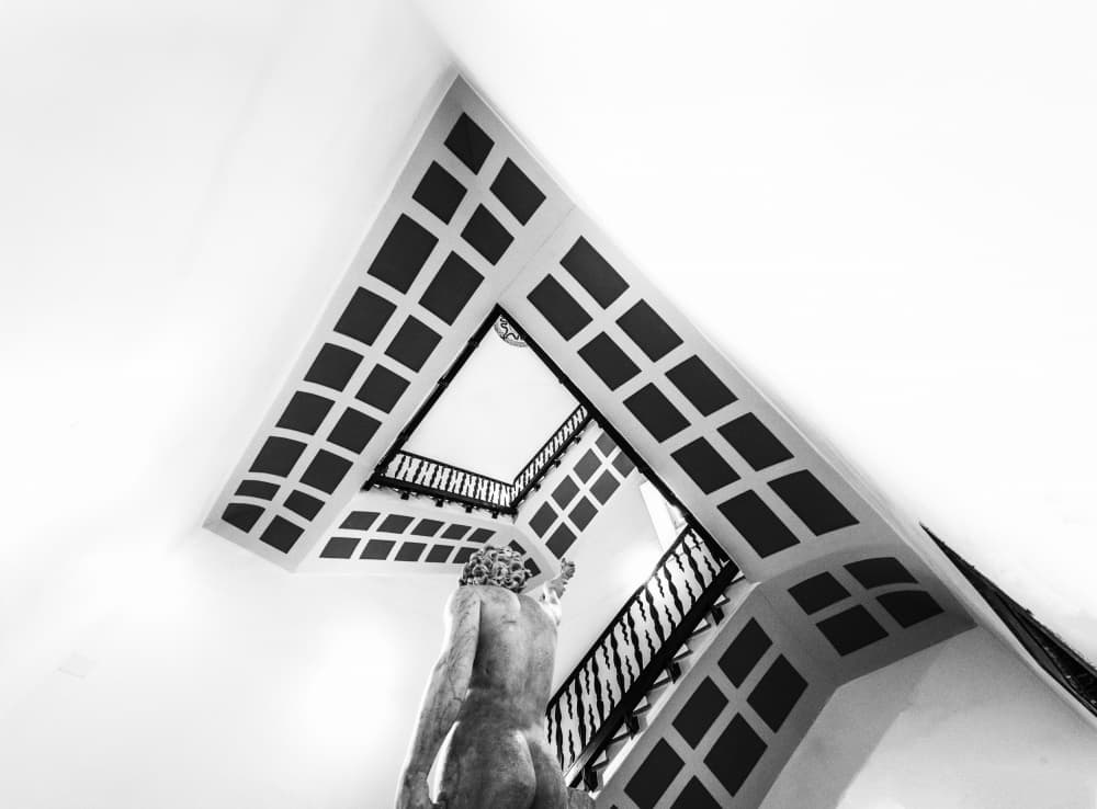 Stairwell With Statue by Ömer Ates Kızıltug — canvas wall art