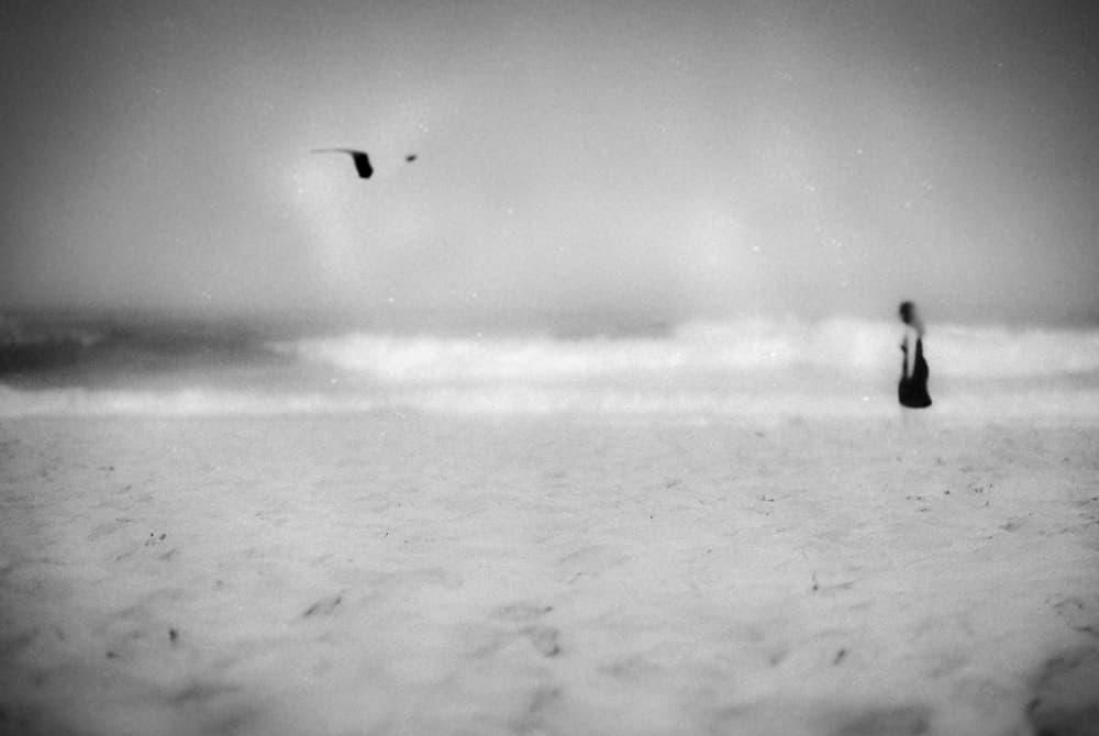 Solitary Woman Ocean by Milena Seita — canvas wall art