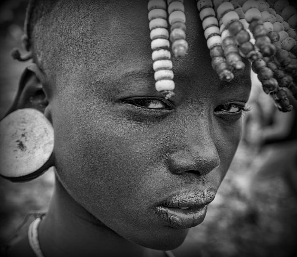 Deep Gaze Tribal Woman by Joxe Inazio Kuesta Garmendia — canvas wall art