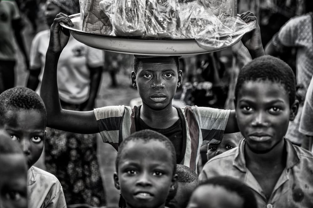 African Market Children by Joxe Inazio Kuesta Garmendia — canvas wall art