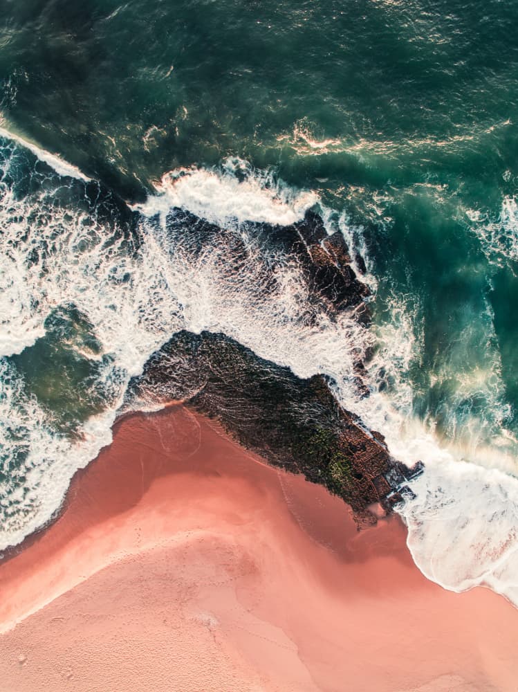 Crashing Waves Pink Sand by Javier Pardina — canvas wall art