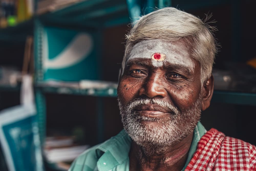 Smiling Indian Man by Marco Tagliarino — canvas wall art