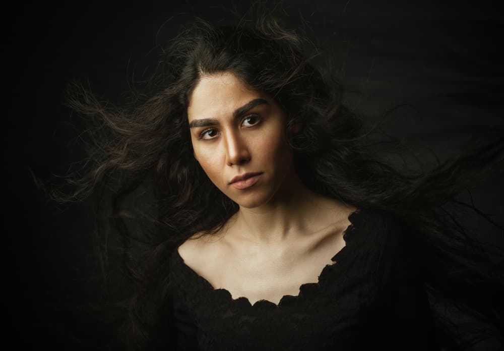 Woman With Flowing Hair by Mehdi Mokhtari — canvas wall art
