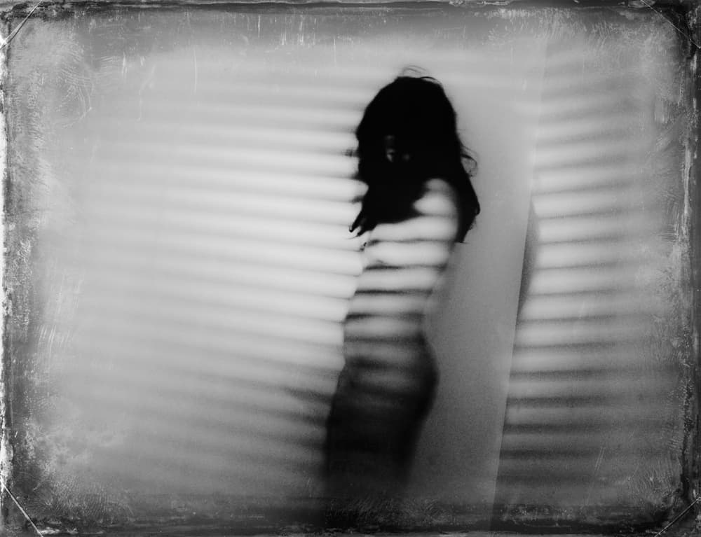 Woman In Striped Shadow by Bogdan Bouşcă — canvas wall art