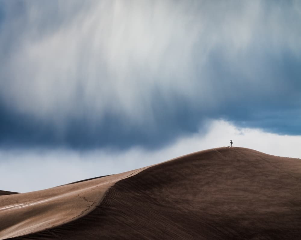 Solitary Figure Desert Dune by John Fan — canvas wall art