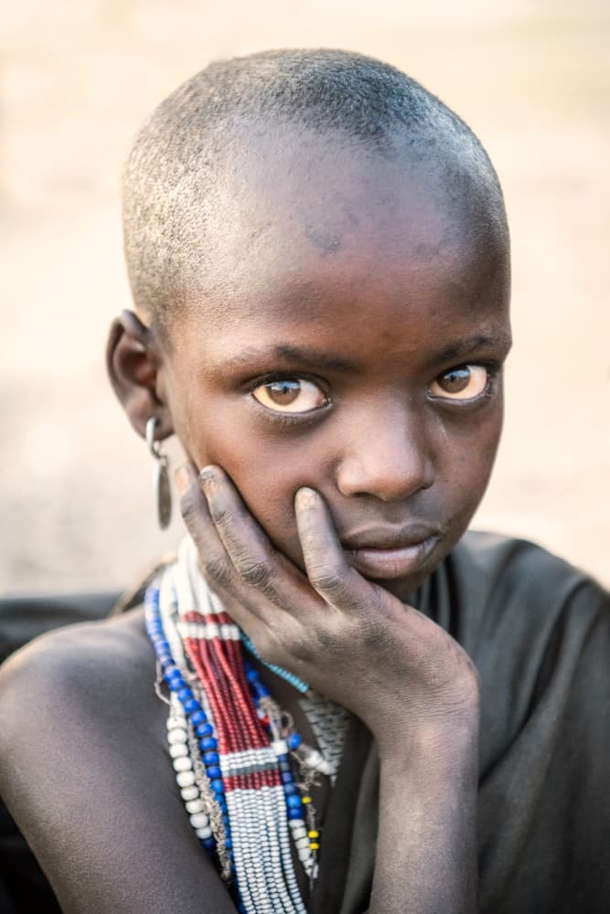 Thoughtful African Child by Trevor Cole — canvas wall art